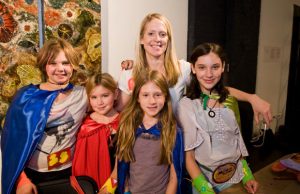 Sarah Fox poses with a few of her art-campers.