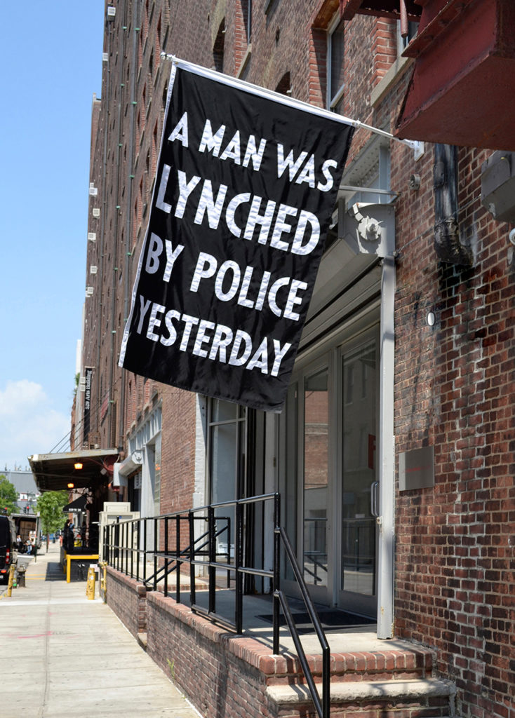 "A Man Was Lynched by Police Yesterday," 2015. Artwork based on NAACP banner "A man was lynched yesterday."  Made in reference to the epidemic of police murder on the occasion of the videotaped police murder of Walter Scott; installed at Jack Shainman gallery July 8, 2016.